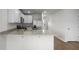 Open kitchen with granite counters, stainless steel appliances, and a breakfast bar at 156 Haventree Ct, Summerville, SC 29486