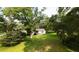 This home sits on a lush green lawn shaded by beautiful, mature trees at 1613 Cavanaugh Rd, Walterboro, SC 29488