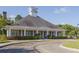 Welcoming clubhouse with a covered porch, white columns, and well-maintained landscaping at 1682 Mermentau St, Mount Pleasant, SC 29466
