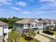 Charming two-story home with gray siding, manicured lawn, and a two-car garage at 1682 Mermentau St, Mount Pleasant, SC 29466