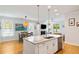 Stylish kitchen featuring a central island, stainless steel appliances, pendant lighting, and an open layout at 1682 Mermentau St, Mount Pleasant, SC 29466