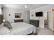 Spacious main bedroom featuring neutral carpeting, two dressers, and a large TV at 1682 Mermentau St, Mount Pleasant, SC 29466