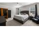 Spacious main bedroom featuring neutral carpeting, a ceiling fan, and ample natural light at 1682 Mermentau St, Mount Pleasant, SC 29466