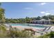 Relaxing community pool area with lounge chairs, picnic tables, and a pool house at 1682 Mermentau St, Mount Pleasant, SC 29466