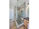 Contemporary bathroom featuring a glass-enclosed shower with stylish tile work and a sleek vanity at 1685 Old Military Rd, Charleston, SC 29412