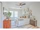 Bedroom featuring modern decor, warm wood accents, and natural textures at 1685 Old Military Rd, Charleston, SC 29412