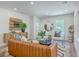 Stylish living room with hardwood floors, a leather sofa, and decorative accents at 1685 Old Military Rd, Charleston, SC 29412
