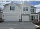 Charming two-story home featuring a three-car garage and stone accents at 178 Grange Cir, Summerville, SC 29486