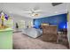 Spacious living room with gray sofa, blue accent wall, and neutral carpet at 183 Calm Water Way, Summerville, SC 29486