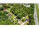 Aerial view of a wooded lot featuring a single-Gathering home near a highway at 1879 Richmond St, Charleston, SC 29407