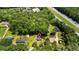 Aerial view of wooded lot and home near a highway at 1879 Richmond St, Charleston, SC 29407