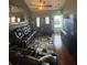 Inviting living room with leather furniture and a ceiling fan at 207 Congaree River Dr, Summerville, SC 29485