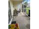 Enclosed back patio with furniture, perfect for enjoying the outdoors with a nice view at 207 Congaree River Dr, Summerville, SC 29485