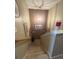 Carpeted stairs with decorative wall art and a chandelier at 207 Congaree River Dr, Summerville, SC 29485