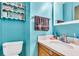 An efficient bathroom featuring modern fixtures, a well-lit mirror, and under sink cabinet at 208 Janice St, Goose Creek, SC 29445