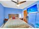 View of bedroom showing the bed, smart tv, a ceiling fan, and a wood closet at 208 Janice St, Goose Creek, SC 29445