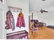 Warm entryway featuring a convenient coat rack and a glimpse into the inviting living area at 208 Janice St, Goose Creek, SC 29445