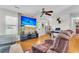 Inviting living room with natural light, a comfortable recliner, and a mounted flat-screen TV at 208 Janice St, Goose Creek, SC 29445