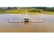 Stunning aerial view of private dock and walkway over the marsh, leading to the waterway at 2312 Rushland Landing Rd, Johns Island, SC 29455