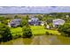 Beautiful two-story home with large lawn, overlooking a pond and near marsh at 2312 Rushland Landing Rd, Johns Island, SC 29455