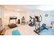 Basement is set up as a gym with carpeted flooring, a treadmill, elliptical, and various workout equipment at 2312 Rushland Landing Rd, Johns Island, SC 29455