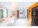 Luxurious primary bathroom featuring double vanity, marble flooring, walk in shower, tub, and a sauna at 2312 Rushland Landing Rd, Johns Island, SC 29455