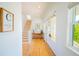 Inviting foyer with hardwood floors and staircase to the second level, showcasing the home's charm at 2312 Rushland Landing Rd, Johns Island, SC 29455