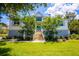 Charming two-story home with manicured lawn and mature trees offering great curb appeal at 2312 Rushland Landing Rd, Johns Island, SC 29455