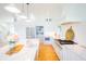 Modern kitchen with white cabinets, quartz countertops, and stainless-steel appliances, perfect for cooking at 2312 Rushland Landing Rd, Johns Island, SC 29455