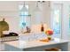 Modern kitchen with a center island, white cabinets, stainless steel appliances, and pendant lighting at 2312 Rushland Landing Rd, Johns Island, SC 29455