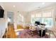 Bright home office with desk, chair, and view of the neighborhood at 2312 Rushland Landing Rd, Johns Island, SC 29455