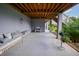 Inviting outdoor space featuring a comfortable seating area, wood ceiling, and a decorative accent, perfect for relaxation at 2312 Rushland Landing Rd, Johns Island, SC 29455