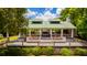 Expansive outdoor pavilion with a green roof, offering a perfect space for dining and entertainment at 2312 Rushland Landing Rd, Johns Island, SC 29455