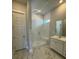 Modern bathroom featuring a glass-enclosed shower, vanity with sink, and tile flooring at 235 Denham St, Summerville, SC 29486