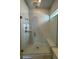 Contemporary glass-enclosed shower with subway tile and a built-in bench at 235 Denham St, Summerville, SC 29486