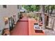 Backyard with multi-tiered wooden deck featuring a firepit table, barbecue and fountain at 2773 Forest Dew Ct, Charleston, SC 29414