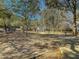 The community park has a walking path, park benches and a playground in the distance at 2773 Forest Dew Ct, Charleston, SC 29414