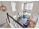 Bright, high-ceilinged living room with fireplace, modern furnishings, and ample windows at 2773 Forest Dew Ct, Charleston, SC 29414