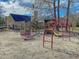 The playground features a playset with slides and a covered, wooden playhouse at 2773 Forest Dew Ct, Charleston, SC 29414