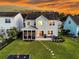 Beautiful backyard featuring a patio, screen porch, and lush lawn with a path at 292 Calm Water Way, Summerville, SC 29486