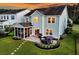 Stunning aerial view of backyard with patio, dining set, and screened porch at 292 Calm Water Way, Summerville, SC 29486