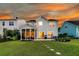 Beautiful backyard featuring a patio, dining set, and screened porch at 292 Calm Water Way, Summerville, SC 29486