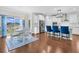 Kitchen and breakfast nook featuring a view, stainless steel appliances, white cabinets, and modern pendant lighting at 292 Calm Water Way, Summerville, SC 29486