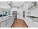 Spacious kitchen featuring an island with granite countertops, stainless steel appliances, and white cabinetry at 292 Calm Water Way, Summerville, SC 29486
