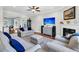 Cozy living room featuring a fireplace, television, and comfortable seating for relaxation at 292 Calm Water Way, Summerville, SC 29486