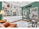 Stylish home office with custom built-in shelving and a large window for ample natural light at 292 Calm Water Way, Summerville, SC 29486