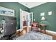 Home office featuring hardwood floors, a desk, and a comfortable chair at 292 Calm Water Way, Summerville, SC 29486