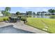 Relaxing backyard patio with dining set overlooking a serene lake at 292 Calm Water Way, Summerville, SC 29486