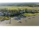 Aerial view of waterfront properties that have docks along the calm water at 3121 Marshgate Dr, Seabrook Island, SC 29455