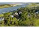 Waterfront homes sit amongst lush trees along a beautiful coastline at 3121 Marshgate Dr, Seabrook Island, SC 29455